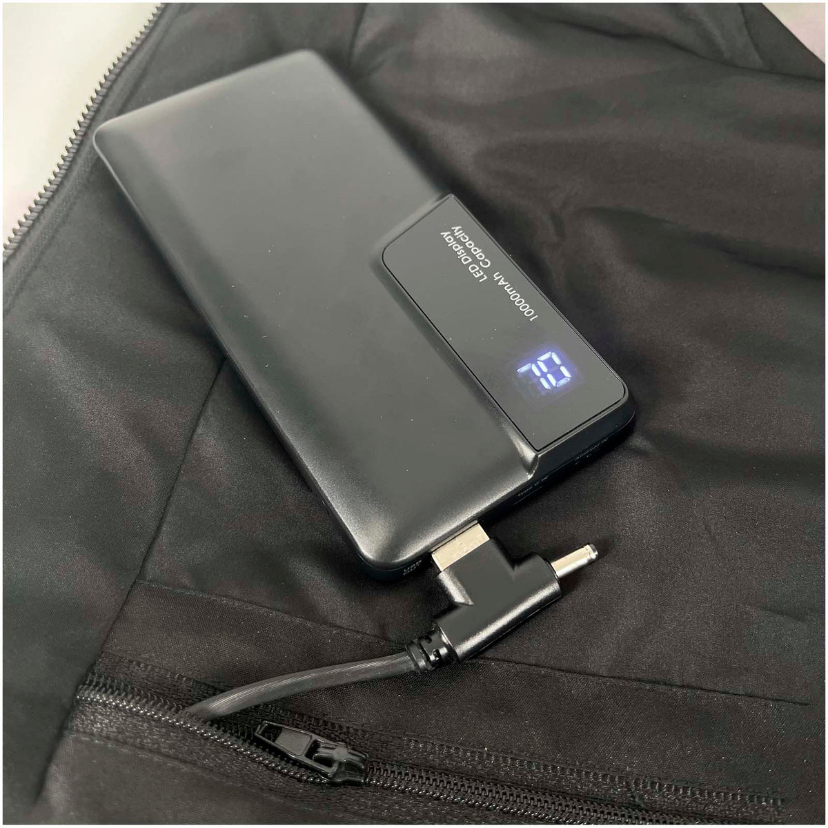 SCX.design G01 uppvärmd väst med powerbank